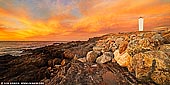 landscapes stock photography | Cape Jervis Lighthouse at Sunset, Fleurieu Peninsula, South Australia (SA), Australia, Image ID AU-CAPE-JERVIS-LIGHTHOUSE-0001. Cape Jervis Lighthouse is a lighthouse located at the headland of Cape Jervis on the most westerly part of the Fleurieu Peninsula, also known as Lands End, on the east coast of Gulf St Vincent in South Australia. It was first lit on 10 August 1871. In 1972, the original tower was replaced by a new tower. Cape Jervis was named by Matthew Flinders after John Jervis, a seaman, rose to become Lord of the Admiralty, 1st Earl of St Vincent on 23 March 1802. Cape Jervis is home to some of the best sea and country views to be found in South Australia with views overlooking Backstairs Passage and Kangaroo Island. Cape Jervis is the jumping off point for daily car and passenger ferry services to Kangaroo Island. It is a 45 minute journey that reveals the spectacular coastline of this part of the Fleurieu Peninsula. The Sealink ferry departs daily for the island. Be sure to stop at the lookout before the ferry terminal and enjoy the panorama. The famous 1,200 km long Heysen Trail starts at Cape Jervis, while Deep Creek and Talisker Conservation Parks are located nearby. Morgan's Beach is a popular fishing and swimming cove and Fishery Beach is as the name suggests, a great fishing spot. Many fishing charter operators base themselves at Cape Jervis, so there is always an opportunity to wet a line. Cape Jervis is on Tourist Route 52 and part of the Fleurieu Way Tourist Drive.