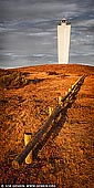 landscapes stock photography | Cape Jervis Lighthouse, Fleurieu Peninsula, South Australia (SA), Australia, Image ID AU-CAPE-JERVIS-LIGHTHOUSE-0002. Vertical panoramic image of the Cape Jervis Lighthouse in South Australia on a late afternoon. Too often people are travelling to or from Kangaroo Island just passing this beautiful lighthouse without stopping, relaxing and watching beautiful sunsets. Vibrant hues created by the sunset is a vision of beauty.
