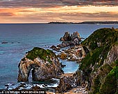 landscapes stock photography | Sunset at Horse Head Rock, Bermagui, Sapphire Coast, NSW South Coast, NSW, Australia, Image ID AU-BERMAGUI-HORSE-HEAD-ROCK-0001. Horse Head Rock and Camel Rock on the South Coast of NSW near Bermagui. Five minutes drive north from Bermagui along Wallaga Lake Road will bring you to the turn off to Camel Rock and Horse Head Rock. These striking rock formations were identified and named by Bass and Flinders during the first mapping of the coastline of the colony of New South Wales. Camel Rock and Horse Head Rock are popular scenic attractions with car parking, a picnic area under the shade of several large trees and toilet facilities. Take the walking track just before the viewing platform to Murunna Point, a significant Aboriginal place, which overlooks Wallaga Lake where it opens to the sea.