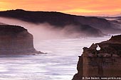landscapes stock photography | Early Morning Mist Flowing Down the Slopes at Twelve Apostles, Great Ocean Road, Port Campbell National Park, Victoria, Australia, Image ID APOST-0003. 