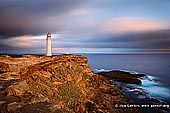 landscapes stock photography | Cape Nelson Lighthouse, Cape Nelson, Victoria (VIC), Australia, Image ID AU-CAPE-NELSON-LIGHTHOUSE-0001. A fascinating piece of Victoria's maritime history, the Cape Nelson Lighthouse is located on the Great South West Walk in the Cape Nelson State Park, near Portland on Victoria's southwest coast in Australia and offers spectacular coastal cliffs, diverse bird life and picturesque walks. The lighthouse was completed in 1884 and today offers accommodation in the Light Station Keepers Cottages.