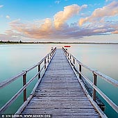 landscapes stock photography | Ellen Cove Jetty at Sunset, Middleton Beach, Albany, Western Australia (WA), Australia, Image ID AU-WA-ALBANY-ELLEN-COVE-JETTY-0001. Ellen Cove Jetty also known as Middleton Beach Jetty is a jetty found at the southern end of Middleton Beach in King George Sound in Albany in the Great Southern region of Western Australia. The Jetty was originally built in 1900 as an alternative to off-load supplies and stock, as some larger ships could not navigate the entrance to Princess Royal Harbour and use the main port. Once port facilities improved the jetty was no longer used for this purpose. It is now primarily used for recreational purposes. It is a popular swimming and fishing spot, and an iconic part of Ellen Cove featured in many photographs of the area.