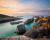 landscapes stock photography | Elephant Rocks, Denmark, South-West Coast, Western Australia, Australia, Image ID AU-WA-ELEPHANT-ROCKS-0002. Elephant Rocks are located 15 kilometres from the town of Denmark in William Bay National Park, south-west WA, about a 4.5-hour drive from Perth. Elephant Rocks and Greens Pool are part of the William Bay National Park known for its rugged coastal scenery. Elephant Rocks are named after the two large elephant-like granite boulders that occupy the upper part of the beach. The steep 60m long beach is located in a 60m wide gap in the bordering granite. At the shore it is fronted by more boulders, which narrow the small bay to about 20 m in width. It widens past the boulders into a protected deep pool in lee of more granite reefs extending 100m seaward, with high wave breaking on the outer rocks. This sheltered beach is absolutely stunning and perfect for family relaxing, swimming and snorkelling.