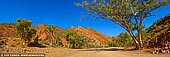 landscapes stock photography | Brachina Gorge, Flinders Ranges, SA, Australia, Image ID AU-SA-FLINDERS-0017. Brachina Gorge is one of the Flinders Ranges National Park's most popular and spectacular tourist attractions. The gorge is an important refuge for the Yellow Footed Rock Wallaby as well as many species of birds and reptiles. The Brachina Gorge Geological Trail is a 20 kilometre self-guided trail that passes through 130 million years of earth history. Trail signage provides an insight into past climates, the formation of the ranges and the evolution of early life forms. The trail is best travelled from east to west, commencing at the Brachina Gorge/Blinman Road junction.