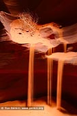 landscapes stock photography | Upper Antelope Canyon Sandfall, Navajo Tribal Park, Page, Arizona, USA, Image ID US-ARIZONA-ANTELOPE-CANYON-0003. Stock image of sand flows like a waterfall from the desert floor to the canyon below in the Upper Antelope Canyon in Navajo Tribal Park, Page, Arizona, USA.