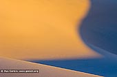 landscapes stock photography | Mesquite Flat Sand Dunes at Sunrise, Death Valley, California, USA, Image ID US-DEATH-VALLEY-0003. Abstract dune pattern in rich yellow by the rising sun at Mesquite Flat Sand Dunes in Death Valley National Park, California, USA.