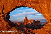 landscapes stock photography | Sunrise at Windows and Turret Arch, Arches National Park, Utah, USA, Image ID US-UTAH-ARCHES-NATIONAL-PARK-0003. The region called 'The Windows' in Arches National Park, Utah, USA contains magnificent formations like on this stock photo of the Turret Arch through North Window Arch at sunrise.