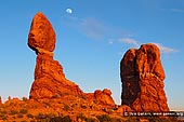 landscapes stock photography | The Balanced Rock at Sunset, Arches National Park, Utah, USA, Image ID US-UTAH-ARCHES-NATIONAL-PARK-0004. Sandstone glows red when setting sun lights the Balanced Rock and surrounding spires in Arches National Park, Utah, USA.