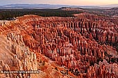 landscapes stock photography | Bryce Amphitheater at Sunrise, Inspiration Point, Bryce Canyon National Park, Utah, USA, Image ID US-BRYCE-CANYON-0001. Landscape views of Bryce Amphitheater at sunrise from the Inspiration Point in the Bryce Canyon National Park, Utah, USA. The unique red sandstone columns are called hoodoos and are unique to the park. They are carved by the relentless freezing and thawing of water trapped in the crevices of the stone.