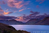 landscapes stock photography | South Part of Thomson Mountains and Lake Wakatipu at Sunrise, Queenstown, Lakes District, Otago, South Island, New Zealand, Image ID NZ-LAKE-WAKATIPU-0002. Great sunrise at Lake Wakatipu from Bennett's Bluff lookout towards south part of Thomson mountains. Lake Wakatipu and the places nearby (Remarkable Mountains, Deer Park, Queenstown and Glenorchy) were the filming locations for many scenes in The Lord of the Rings movie.