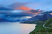 landscapes stock photography | Looking up the Lake Wakatipu Towards Glenorchy at Sunrise, Queenstown, Lakes District, Otago, South Island, New Zealand, Image ID NZ-LAKE-WAKATIPU-0003. Stunning sunrise at Lake Wakatipu from Bennett's Bluff lookout, which is the most spectacular point on the entire road from Queenstown to Glenorchy. From here you can see for the first time right up past the head of Lake Wakatipu with the three islands in the lake. Tree island, a very small one on the left, then Pig Island and Pigeon Island.