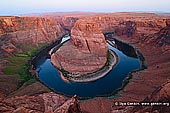 landscapes stock photography | Horseshoe Bend at Twilight, Page, Arizona, USA, Image ID US-ARIZONA-HORSESHOE-BEND-0001. The most classical picture or a cliche photo of the Horseshoe Bend south of Page in Arizona, USA where the Colorado River makes a dramatic, almost circular bend. The towering red cliffs are about 1,000 feet (305 meters) above the river.