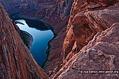 landscapes stock photography | Horseshoe Bend, Page, Arizona, USA, Image ID US-ARIZONA-HORSESHOE-BEND-0003. The view from the rim of Horseshoe Bend of the Colorado River near Page Arizona, USA. It is a very popular spot and is located just outside of Page. This part of the Colorado River is just below Glen Canyon Dam which created Lake Powell and offers easy access to flatwater sections that many people use for recreation year-round. The view of Horseshoe Bend is a popular destination is a 15-minute walk from the parking area to the rim and has fantastic views of the Colorado River.