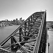 portfolio stock photography | Sydney Harbour Bridge from Pylon Lookout, Sydney, NSW, Australia, Image ID SYDNEY-IN-SQUARE-0016. The Sydney Harbour Bridge Pylon Lookout is a must-see whilst in Sydney. Located on the south side of Sydney Harbour Bridge it provides three levels of exhibits and magnificent panoramic view of the City of Sydney, North Sydney, east towards the heads of Sydney Harbour, the Opera House, Circular Quay, Botanical Gardens and the surrounding areas. Goat Island and Fort Denison can also be seen. On a clear day you can see as far as the Blue Mountains.