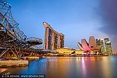  stock photography | Marina Bay Sands Hotel at Sunset, Marina Bay, Singapore, Image ID SINGAPORE-0001. Night view of the Helix Bridge, Marina Bay Sands Hotel with its spectacular rooftop infinity pool and ArtScience Museum in Singapore.