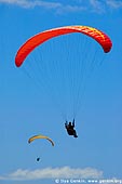  stock photography | Above the Clouds, Paragliders Soaring in the Blue Sky, Image ID MISP0001. 