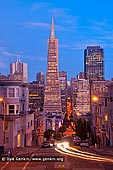usa stock photography | Transamerica Pyramid at Dusk, San Francisco, California, USA, Image ID US-SAN-FRANCISCO-0001. The Transamerica Pyramid is the most recognisable and the tallest skyscraper in the San Francisco skyline. Although the building no longer is the head office of the Transamerica Corporation, it is still strongly associated with the company. Designed by architect William Pereira and built by Hathaway Dinwiddie Construction Company, at 260 m (850 ft), upon completion in 1972 it was among the five tallest buildings in the world.