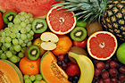 Set of different fresh fruits. Colorful background.